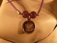 medalla pequeña de amatista (lila). cod 5
