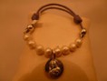 pulseras de cordón lila y medalla de plata. cod 22