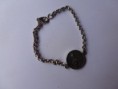 pulsera de plata con cadena de plata y medalla. cod 25